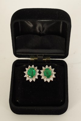 Lot 247 - A LARGE PAIR OF EMERALD AND DIAMOND EARRINGS