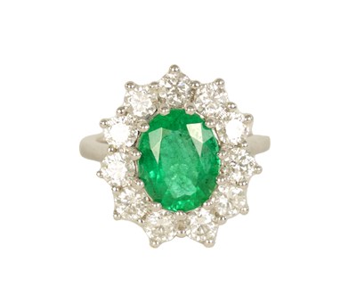 Lot 253 - A LARGE 18CT WHITE GOLD EMERALD AND DIAMOND RING