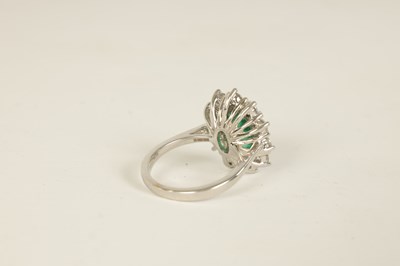 Lot 253 - A LARGE 18CT WHITE GOLD EMERALD AND DIAMOND RING