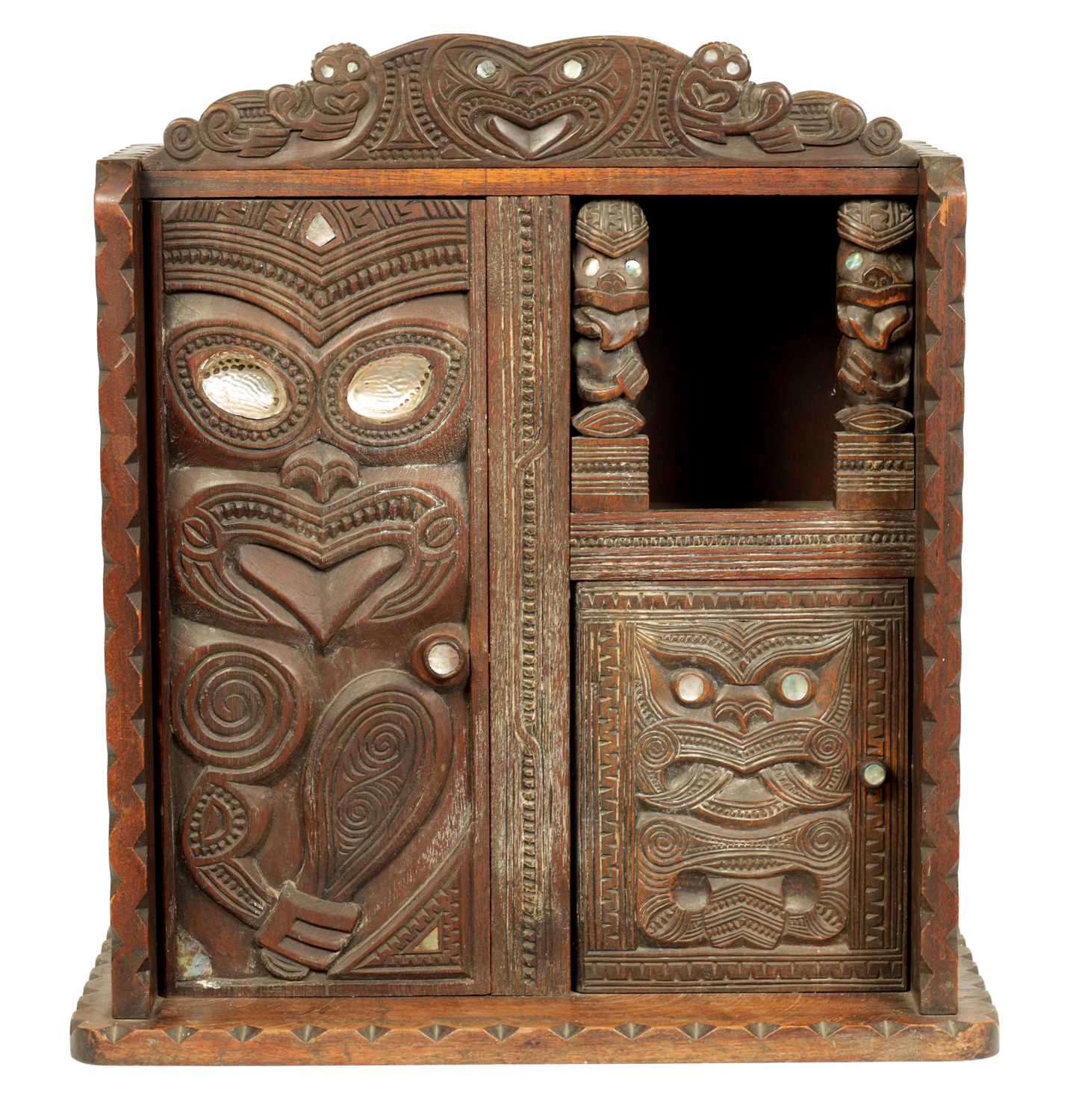 Lot 949 - A MID 20TH CENTURY NEW ZEALAND MAOIRE CARVED HARDWOOD CABINET