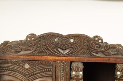 Lot 949 - A MID 20TH CENTURY NEW ZEALAND MAOIRE CARVED HARDWOOD CABINET