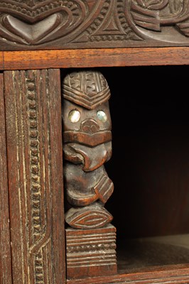 Lot 949 - A MID 20TH CENTURY NEW ZEALAND MAOIRE CARVED HARDWOOD CABINET