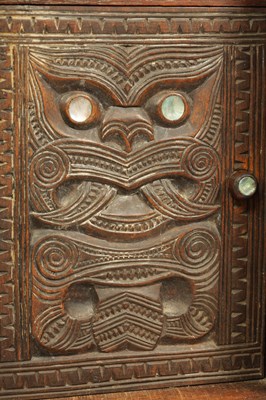 Lot 949 - A MID 20TH CENTURY NEW ZEALAND MAOIRE CARVED HARDWOOD CABINET