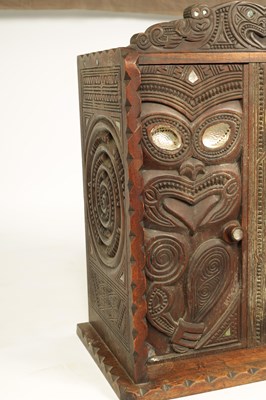 Lot 949 - A MID 20TH CENTURY NEW ZEALAND MAOIRE CARVED HARDWOOD CABINET