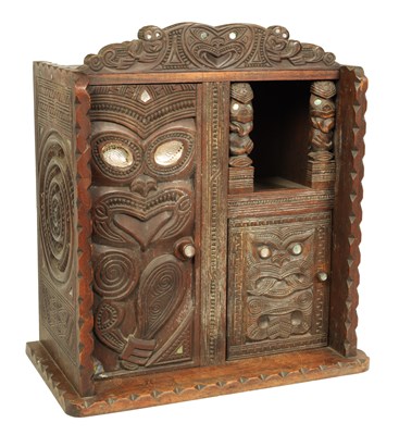 Lot 949 - A MID 20TH CENTURY NEW ZEALAND MAOIRE CARVED HARDWOOD CABINET