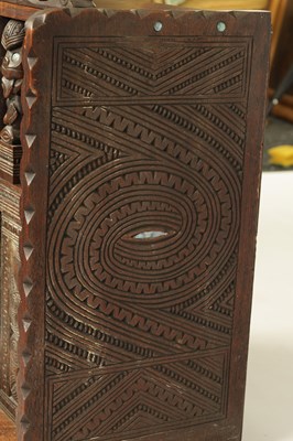 Lot 949 - A MID 20TH CENTURY NEW ZEALAND MAOIRE CARVED HARDWOOD CABINET