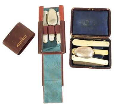 Lot 496 - TWO LATE 19TH CENTURY TRAVELLING KNIFE, FORK AND SPOON SETS