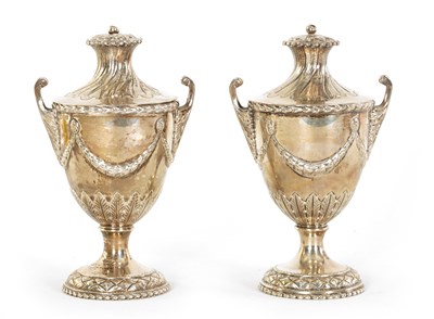 Lot 313 - A PAIR OF EDWARD VII ‘ADAM STYLE’ SILVER TEA CADDIES