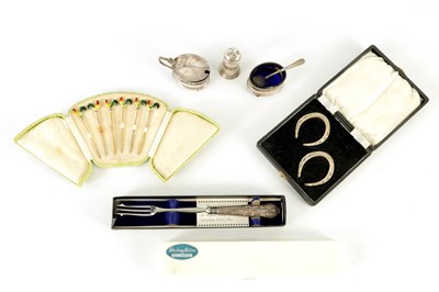 Lot 996 - A SET OF 1930’S CASED SILVER AND ENAMEL COCKTAIL STICKS AND SLVER HORSESHOE NAPKIN RINGS