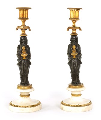 Lot 541 - A FINE PAIR OF REGENCY FIGURAL BRONZE AND ORMOLU CANDLESTICKS