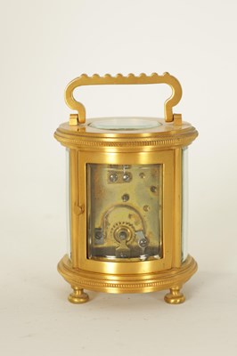 Lot 686 - A LATE 19TH CENTURY GILT BRASS FRENCH MINIATURE CYLINDRICAL CARRIAGE CLOCK