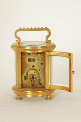 Lot 686 - A LATE 19TH CENTURY GILT BRASS FRENCH MINIATURE CYLINDRICAL CARRIAGE CLOCK