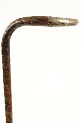 Lot 369 - AN EARLY 20TH CENTURY FAUX BAMBOO HAREWOOD SILVER TOPPED WALKING STICK