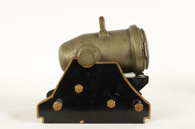 Lot 797 - A LATE 19TH CENTURY FRENCH INDUSTRIAL SILVERED BRASS DESK CLOCK FORMED AS A CANNON