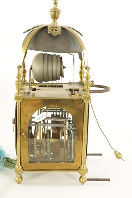 Lot 904 - A RARE EARLY 18TH CENTURY BRASS QUARTER STRIKING SINGLE HANDED VERGE LANTERN CLOCK