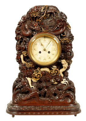 Lot 202 - A MEIJI PERIOD JAPANESE HARDWOOD, IVORY AND LACQUERWORK TABLE CLOCK