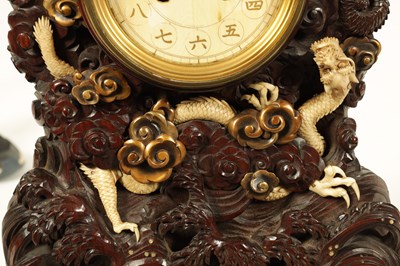 Lot 202 - A MEIJI PERIOD JAPANESE HARDWOOD, IVORY AND LACQUERWORK TABLE CLOCK