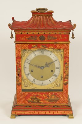 Lot 794 - A LATE 19TH CENTURY RED LACQUER AND CHINOISERIE DECORATED QUARTER CHIMING BRACKET CLOCK