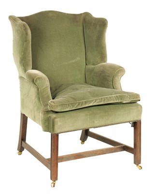 Lot 884 - A GEORGE III WING-BACK MAHOGANY FRAMED UPHOLSTERED ARMCHAIR