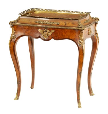 Lot 858 - A 19TH CENTURY ORMOLU MOUNTED AND ROSEWOOD CROSS-BANDED FIGURED WALNUT JARDINIERE TABLE