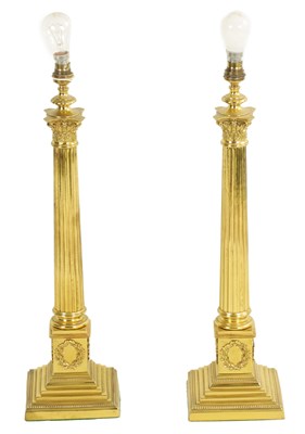 Lot 1271 - A GOOD PAIR OF 19TH CENTURY STYLE CORINTHIAN COLUMN BRASS TABLE LAMPS