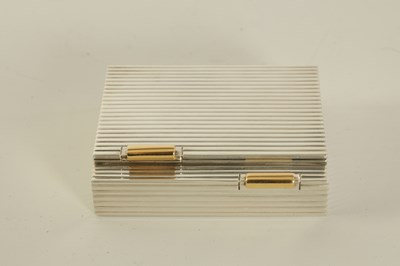 Lot 230 - CARTIER, PARIS  A MID 20TH CENTURY FRENCH SILVER AND GOLD MOUNTED LADIES POWDER COMPACT