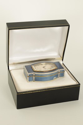 Lot 683 - AN UNUSUAL ART DECO SILVER GILT AND BLUE WHITE EDGED GUILLOCHE ENAMEL COMBINED DESK CLOCK/STAMP BOX