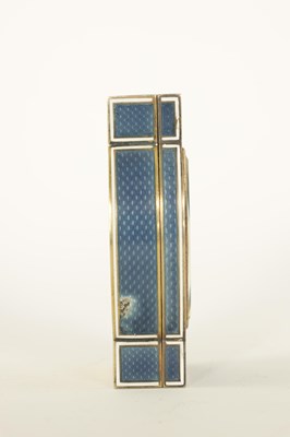 Lot 683 - AN UNUSUAL ART DECO SILVER GILT AND BLUE WHITE EDGED GUILLOCHE ENAMEL COMBINED DESK CLOCK/STAMP BOX