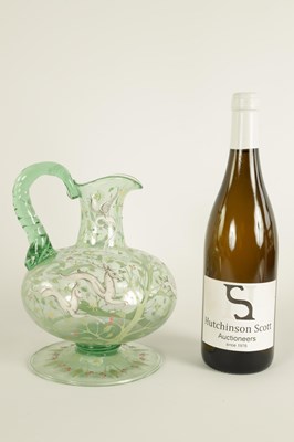 Lot 10 - AN 18TH/19TH CENTURY CONTINENTAL PALE GREEN GLASS EWER