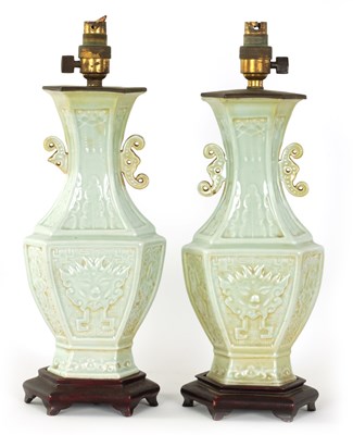 Lot 97 - A PAIR OF CHINESE CELADON GLAZED VASE LAMPS
