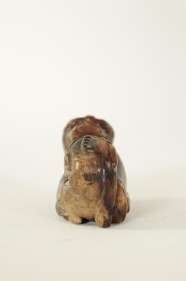 Lot 168 - A CHINESE CARVED RUSSET JADE SCULPTURE