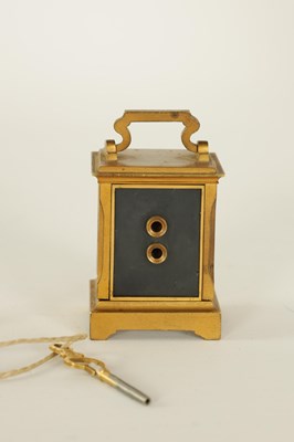Lot 687 - A FRENCH MINIATURE GILT AND ENAMEL PANELLED CARRIAGE CLOCK CIRCA 1900