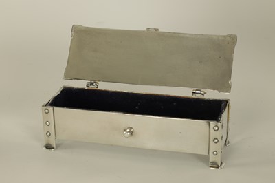 Lot 280 - A 20TH CENTURY SILVER PLATED LIDDED DRESSING TABLE BOX TOGETHER WITH A EMBOSSED BRASS LIDDED BOX