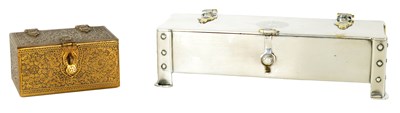 Lot 200 - A 20TH CENTURY SILVER PLATED LIDDED DRESSING TABLE BOX TOGETHER WITH A EMBOSSED BRASS LIDDED BOX