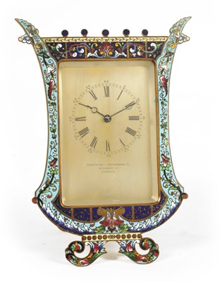 Lot 810 - A LATE 19TH CENTURY FRENCH CHAMPLEVE ENAMEL STRUT CLOCK