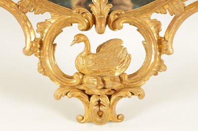 Lot 996 - A FINE MID 18TH CENTURY OVAL CARVED GILT GESSO HANGING MIRROR IN THE MANNER OF THOMAS CHIPPENDALE