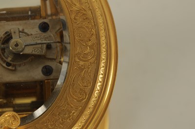 Lot 696 - A LATE 19TH CENTURY OVAL ENGRAVED GILT BRASS REPEATING CARRIAGE CLOCK