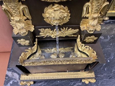 Lot 771 - AN EARLY 19TH CENTURY FRENCH EMPIRE MUSICAL AUTOMATON BRONZE AND ORMOLU MANTEL CLOCK