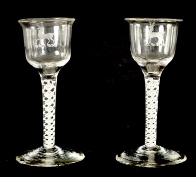 Lot 5 - A PAIR OF 19TH CENTURY ARMORIAL WINE GLASSES OF GENEROUS SIZE