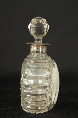 Lot 7 - AN UNUSUAL 19TH CENTURY SULPHIDE MASK HEAD AND CUT GLASS  TOILET WATER BOTTLE AND STOPPER
