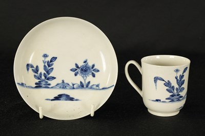 Lot 17 - AN 18TH CENTURY WORCESTER TYPE BLUE AND WHITE TEA CUP AND SAUCER