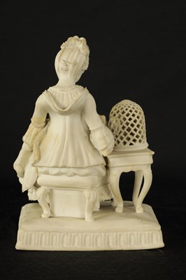 Lot 19 - AN 18TH/EARLY 19TH CENTURY BISQUE PORCELAIN SEATED LADY FIGURE AFTER MEISSEN