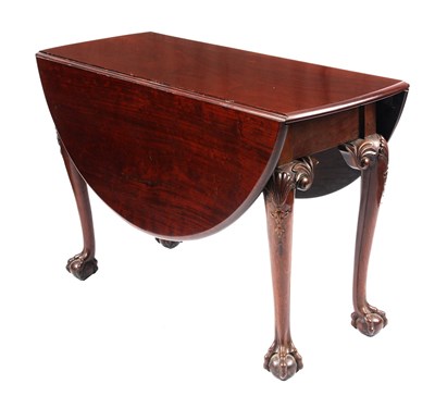 Lot 859 - A GEORGE II IRISH CHIPPENDALE WALNUT DROP LEAF...