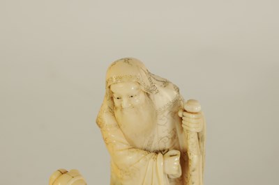 Lot 129 - AN EARLY 19TH CENTURY CARVED IVORY FIGURE GROUP