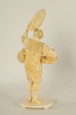 Lot 159 - A JAPANESE MEIJI PERIOD CARVED IVORY FIGURE GROUP