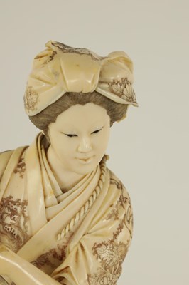 Lot 194 - A LARGE JAPANESE MEIJI PERIOD CARVED IVORY FIGURE GROUP