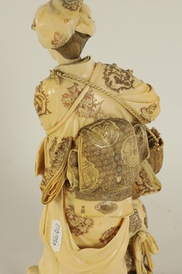 Lot 194 - A LARGE JAPANESE MEIJI PERIOD CARVED IVORY FIGURE GROUP
