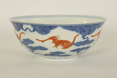 Lot 138 - A CHINESE GUANGXI PERIOD IRON-RED DECORATED BLUE AND WHITE BAT BOWL