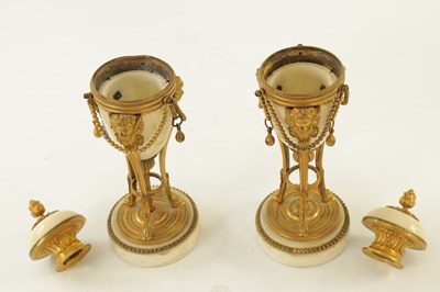 Lot 573 - A PAIR OF 19TH CENTURY ADAM STYLE ORMOLU MOUNTED WHITE MARBLE REVERSIBLE URNS/CANDLESTICKS