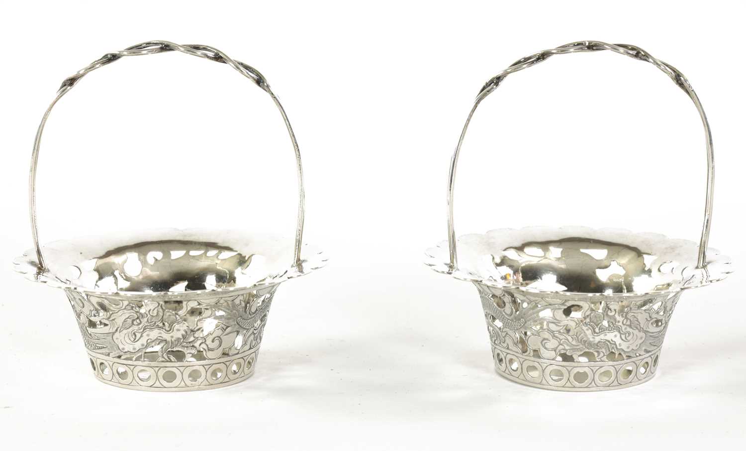 Lot 120 - A PAIR OF CHINESE SILVER SWEETMEAT BASKETS
